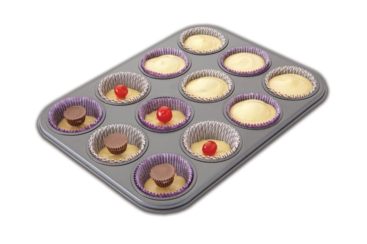 Filled Cupcake Pan - Mini Filled Cupcake Pan - All Things Cupcake : Use a tablespoon to carefully fill half of the cup with the first batter.